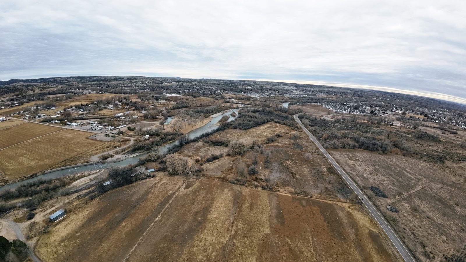Drone aerial of the farm fields and surrounding valley at Gomez Farm, San Juan County, New Mexico