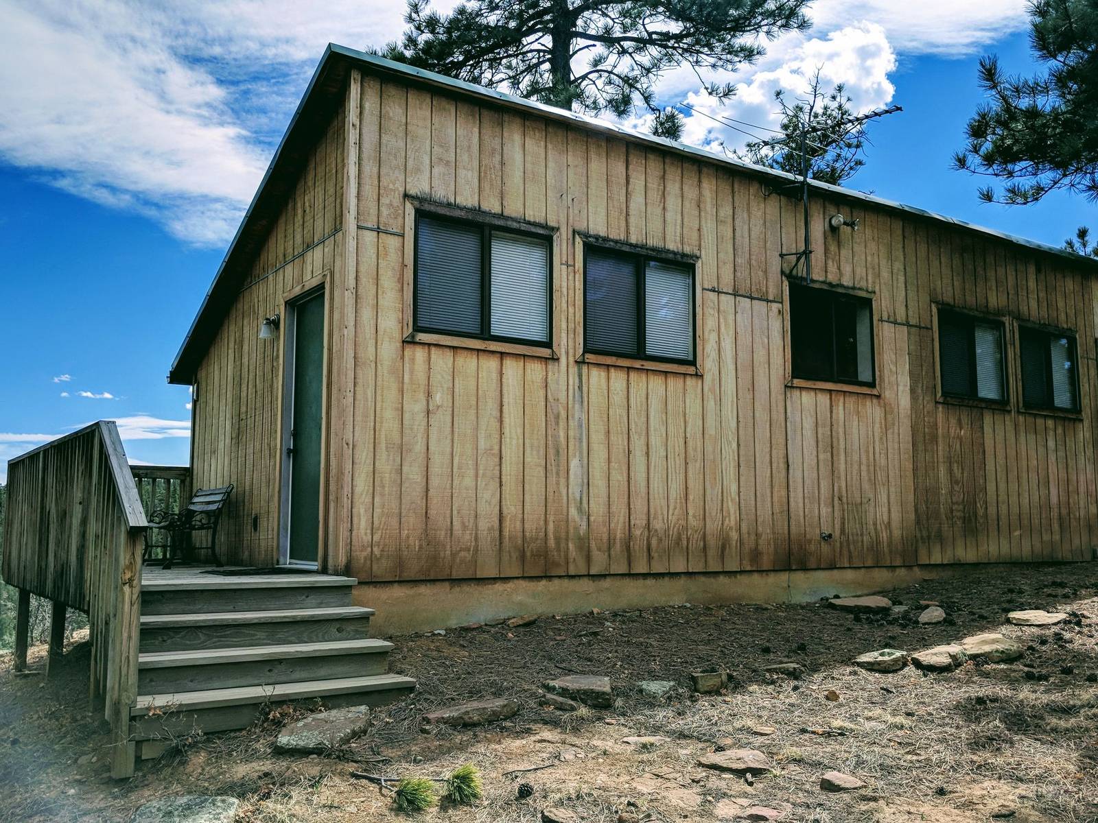 Wood house among pines at Wilderness Ridge, Las Animas County, Colorado